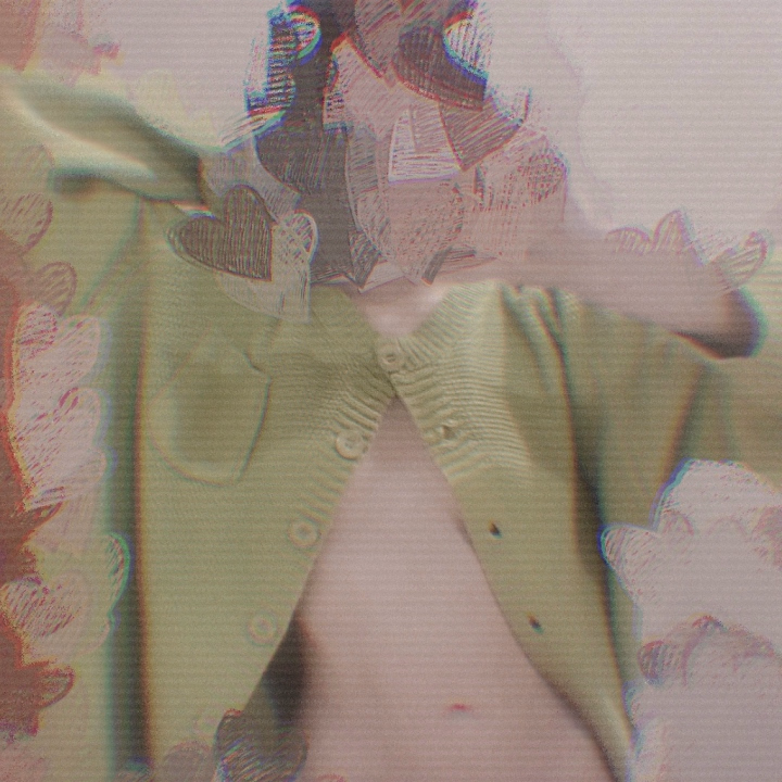 裸エプロンならぬ  裸カーディガン。